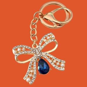 Pearl & Crystal Bow Bag Charm / Keychain  with Blue Teardrop Gem